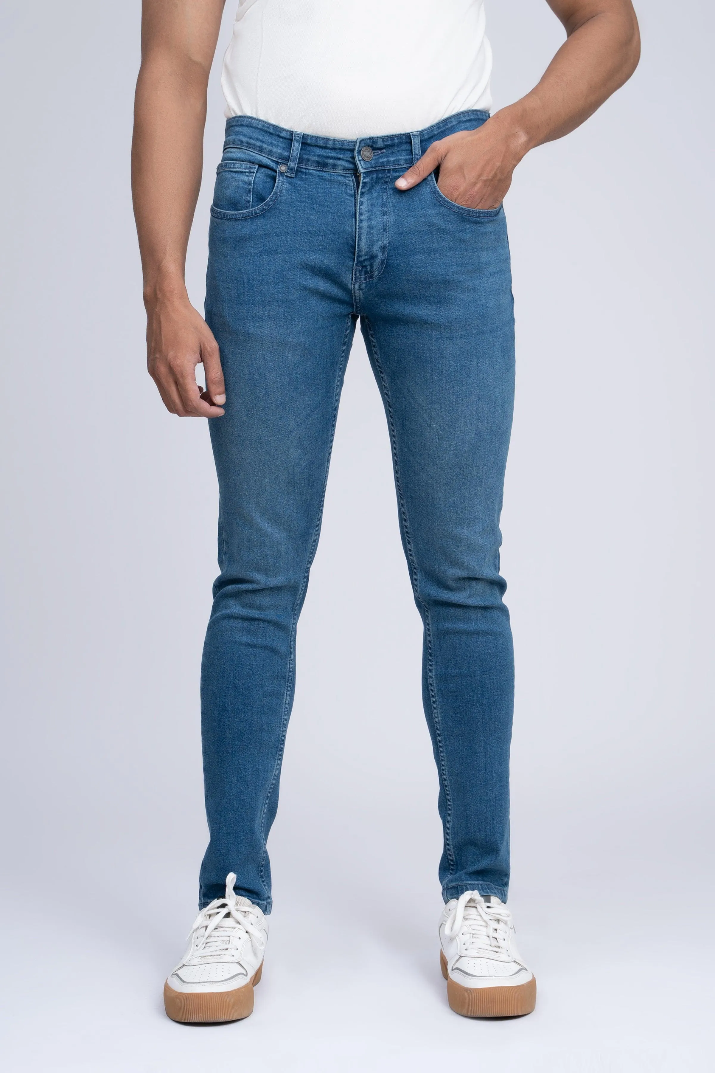 JEAN SLIM LEG LIGHT BLUE TINTED