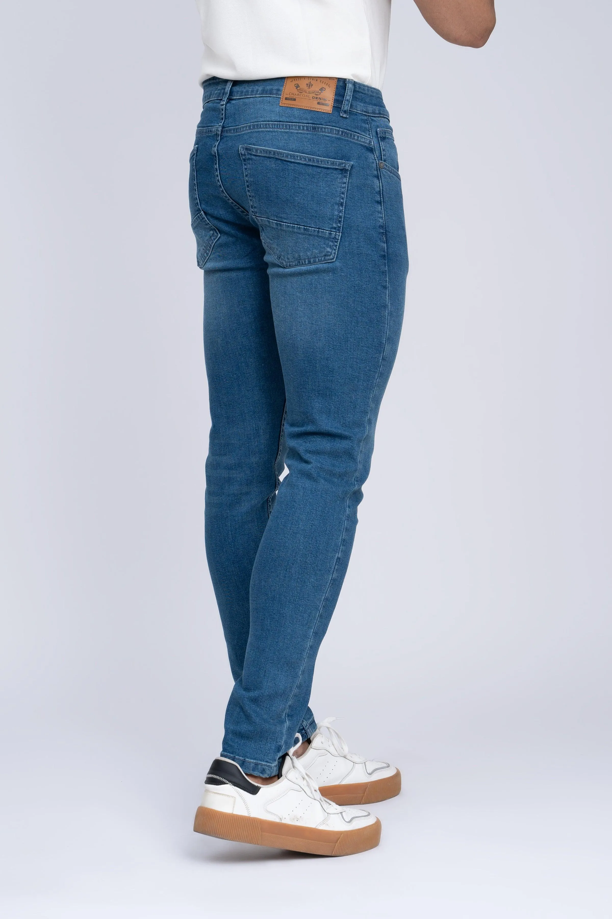 JEAN SLIM LEG LIGHT BLUE TINTED
